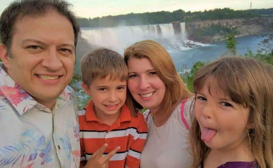 A photo of Katie Beers with her husband and kids.