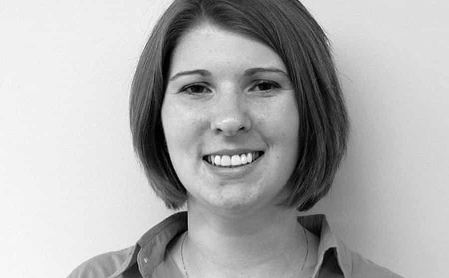 A photo of Katie smiling at the camera.