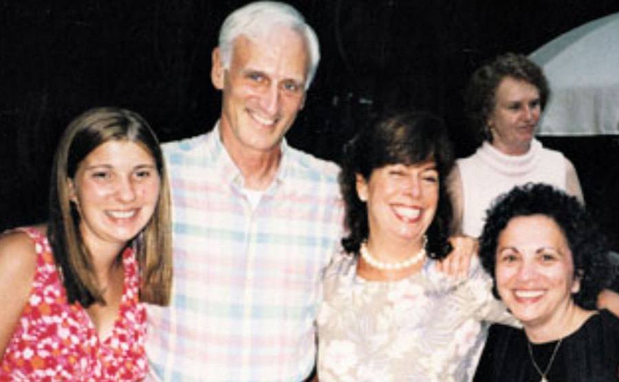A dated picture of Katie with her foster family.