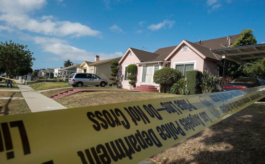 Police tape hangs in front of Michael’s home.