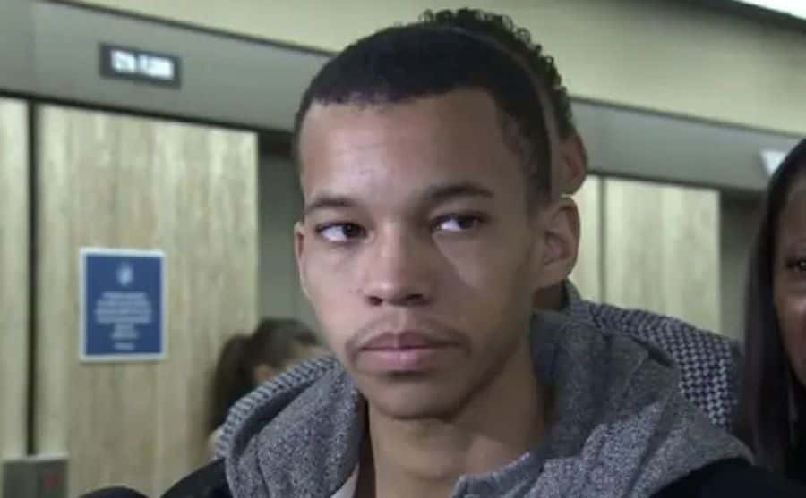 A still of Nehemiah addressing the media.
