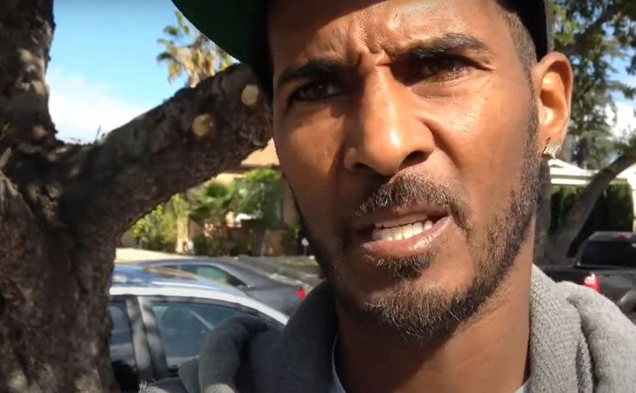 April and Michael’s neighbor speaks during an interview.
