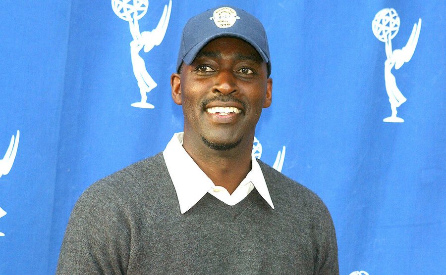 A photo of Michael posing for the press.