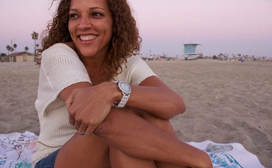 A photo of April by the beach.