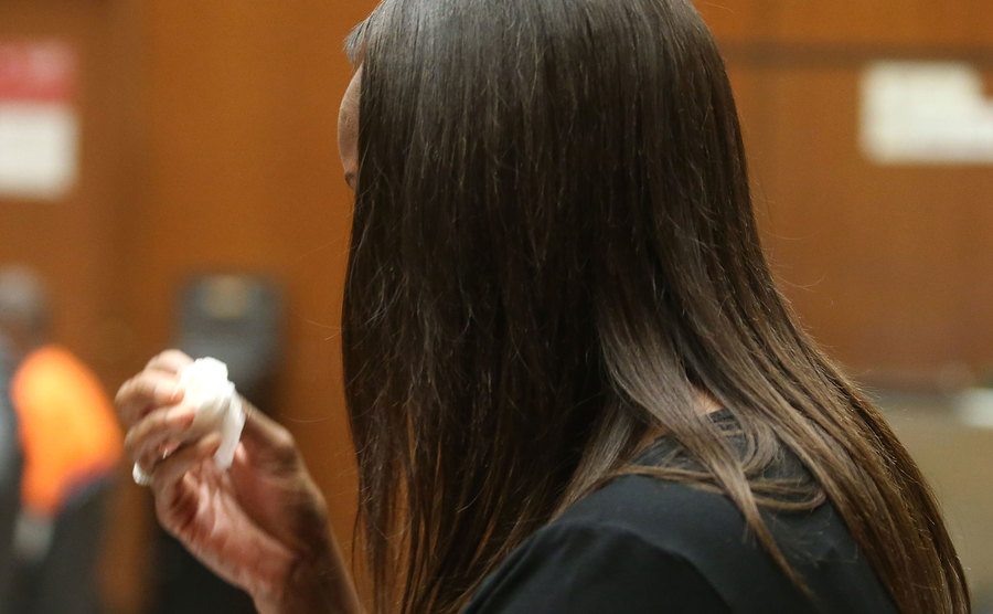 A photo of a witness during the trial.