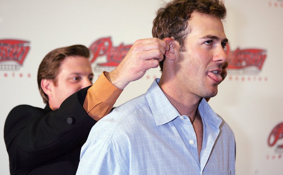Chip and Chris Jacobs pose for the press.