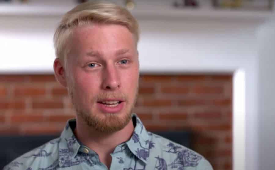 Ethan speaks during an interview.