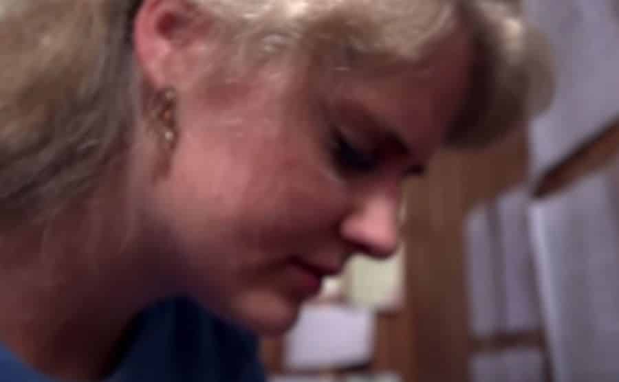 A still of Lydia in her prayer closet.