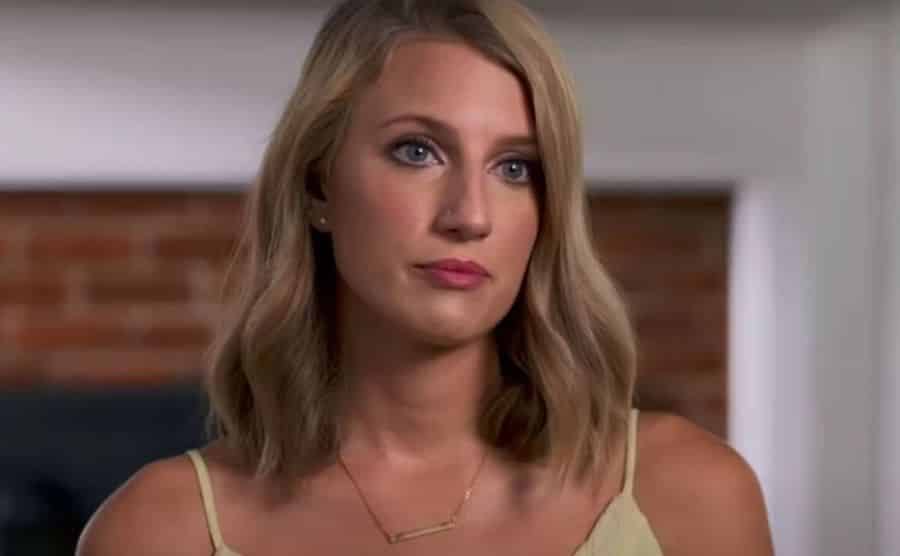 A still of Olivia during an interview.