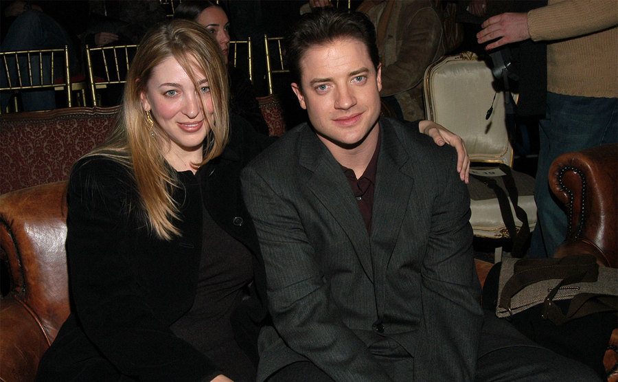 Afton Smith and Brendan Fraser attend an event.