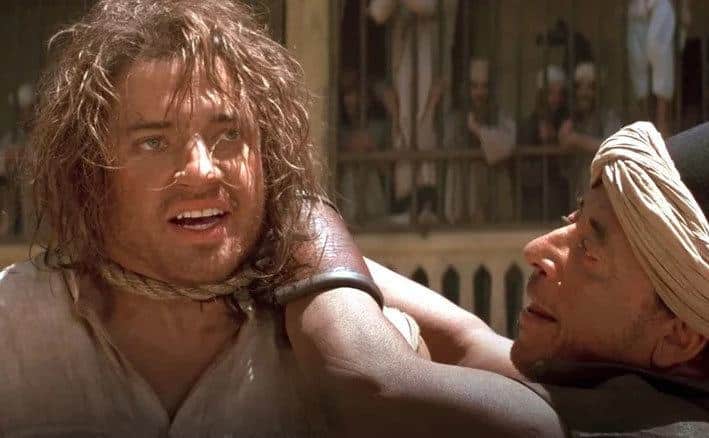 Fraser has a noose around his neck in a still from The Mummy.