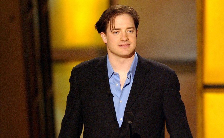 Brendan Fraser presents at an awards show.