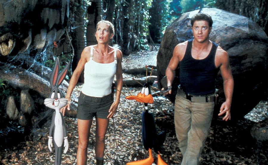 Bugs Bunny, Jenna Elfman, Brendan Fraser, and Daffy Duck in a still from the film.