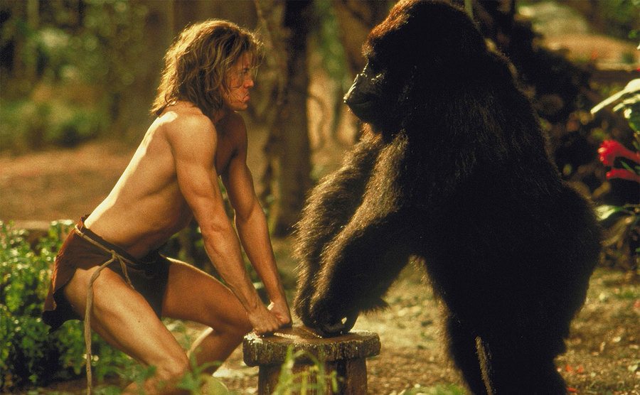Brendan Fraser as George of the Jungle squares off with a gorilla.