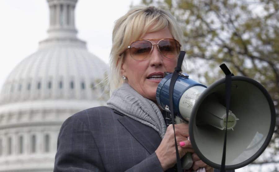 An image of Erin Brockovich addressing a rally.