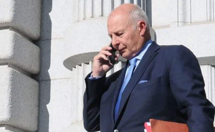 A photo of Girardi leaving the courthouse.