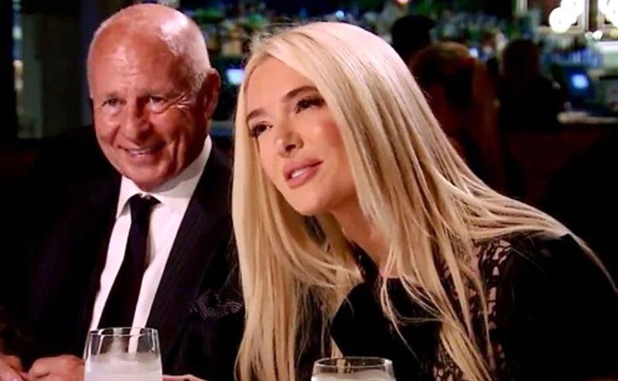 A still of Girardi and Erika in an episode from The Real Housewives.