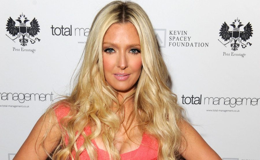 A dated photo of Erika attending an event.