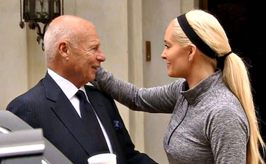 An image of Girardi and Erika at the entrance to their home.