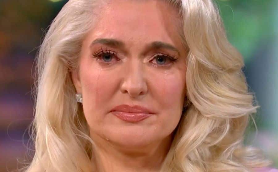 Erika cries during an interview.