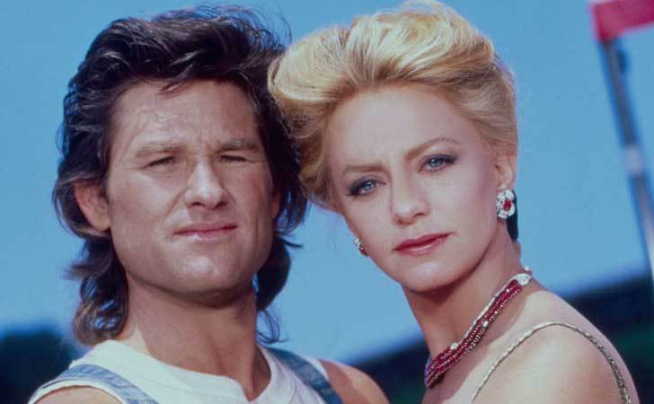 Goldie Hawn and Kurt Russell pose for a portrait.
