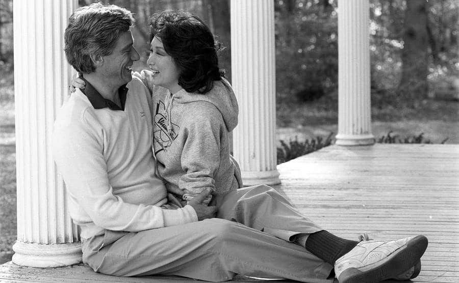 Connie Chung and Maury Povich relax on the porch of their country house.