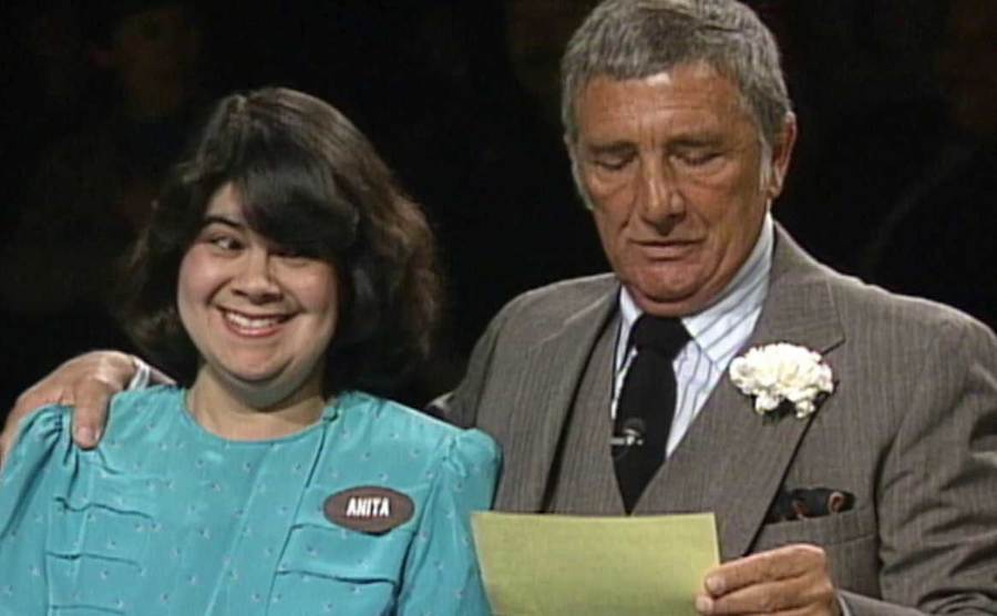 Dawson explains to a contestant the rules.