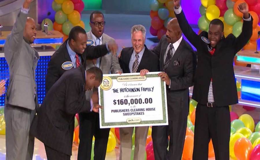 Steve Harvey celebrates with a winning family.
