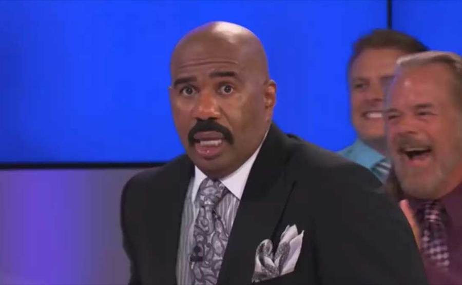 Steve Harvey looks shocked while on the set of Family Feud.