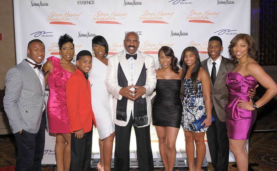 Steve Harvey attends an event with his family.