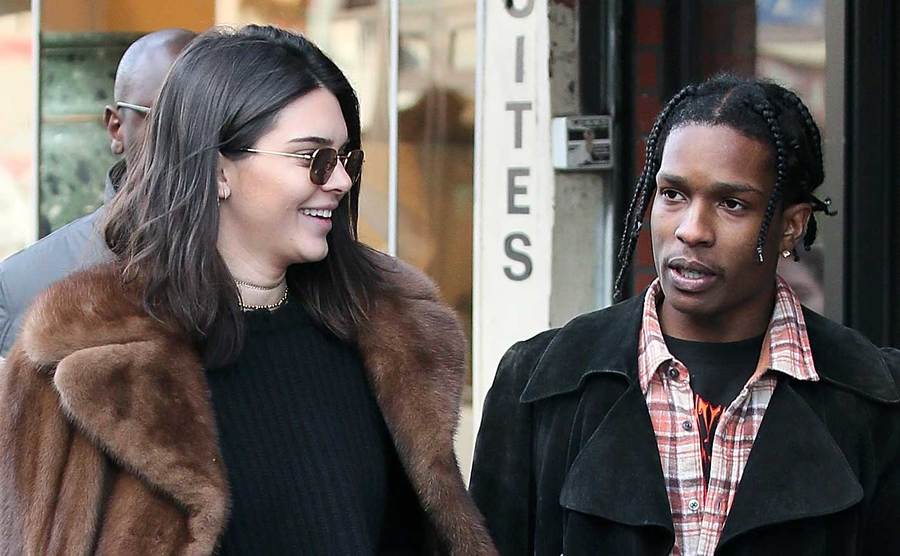 Kendall Jenner walks with Asap Rocky at the flea market.