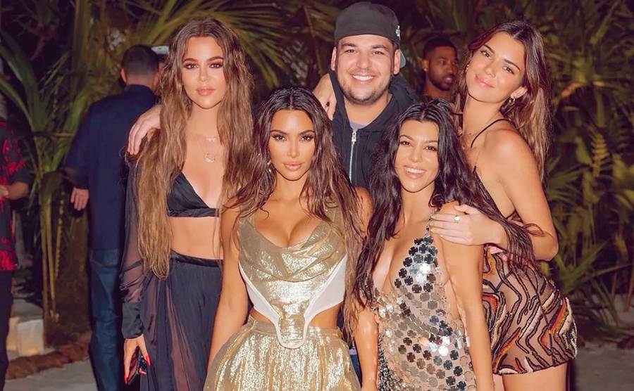 Khloé, Rob, Kendall, Kim and Kourtney pose at Kim’s Birthday Party.