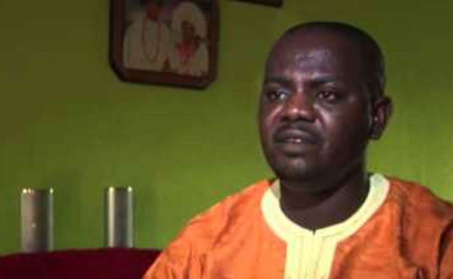 Okene is interviewed at home.