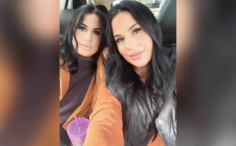 Jessica and Christina take a selfie in the car.