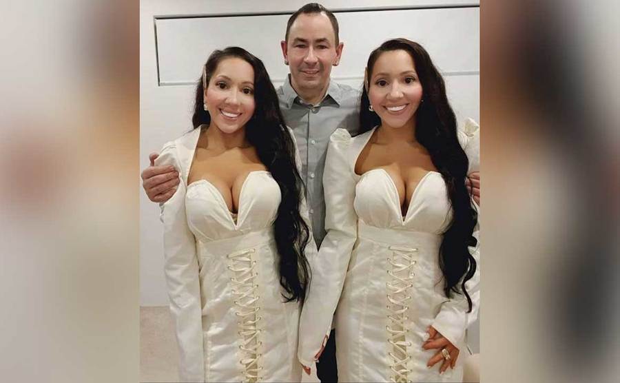 Anna and Lucy pose with their partner.