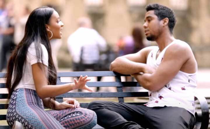 Chantel Everett and Pedro Jimeno have a serious talk on a park bench.