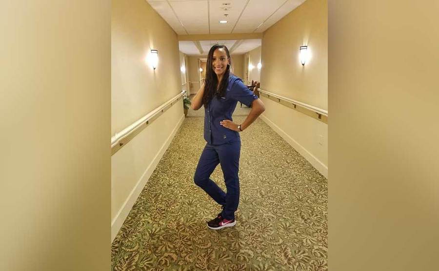 Chantel poses in her scrubs.