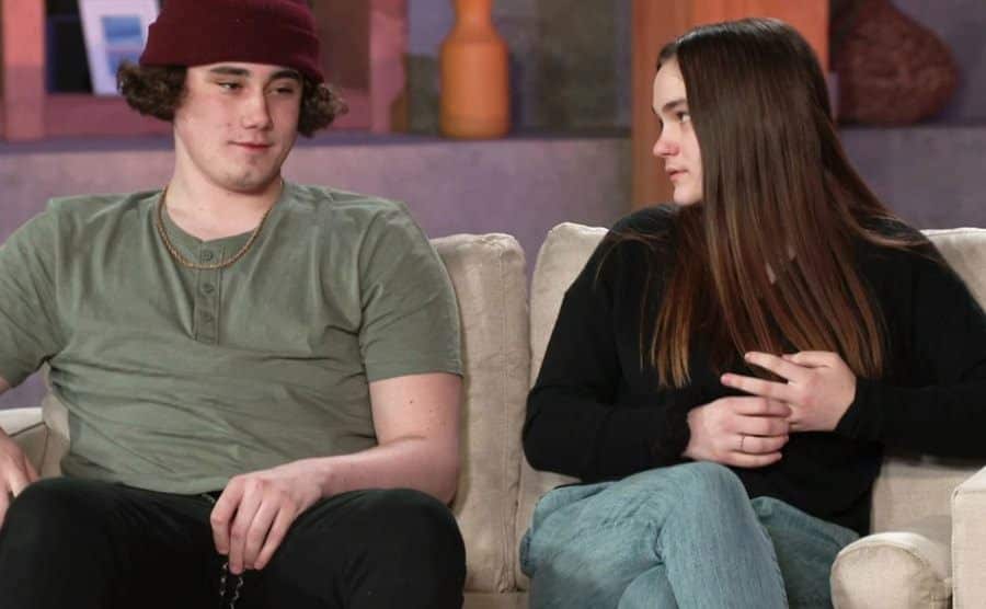 A still of Smith and Korpi during an interview.