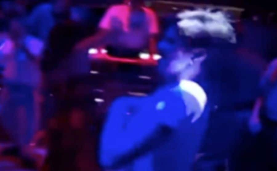 A surveillance tape of Amy dancing in the ship’s club.