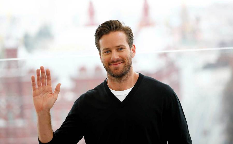 Hammer waves to the press.