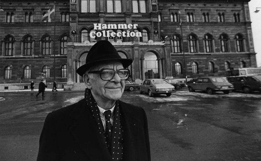 Armand Hammer stands outside the Hammer Collection.