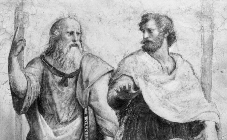 An illustration of Plato and Aristotle having a conversation.