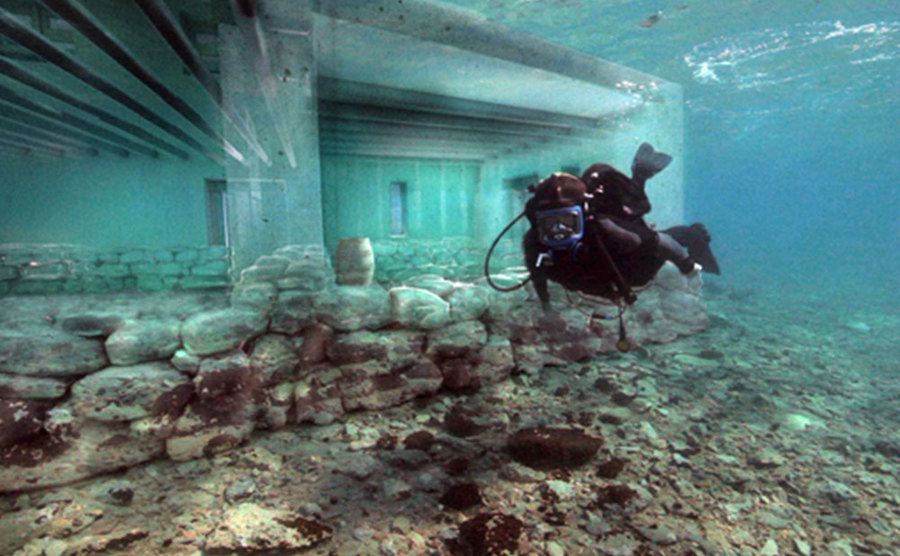 A man dives into the city of Pavlopetri.