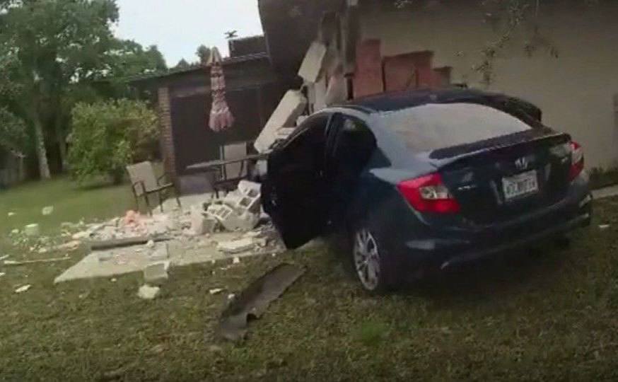 A car crashed into the side of a home.