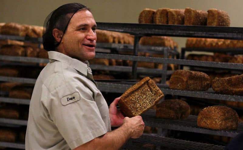 Dave shows off the break made at his bakery.