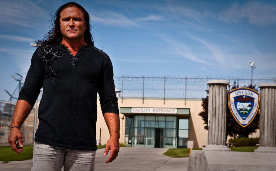 Dave Dahl stand outside of prison.