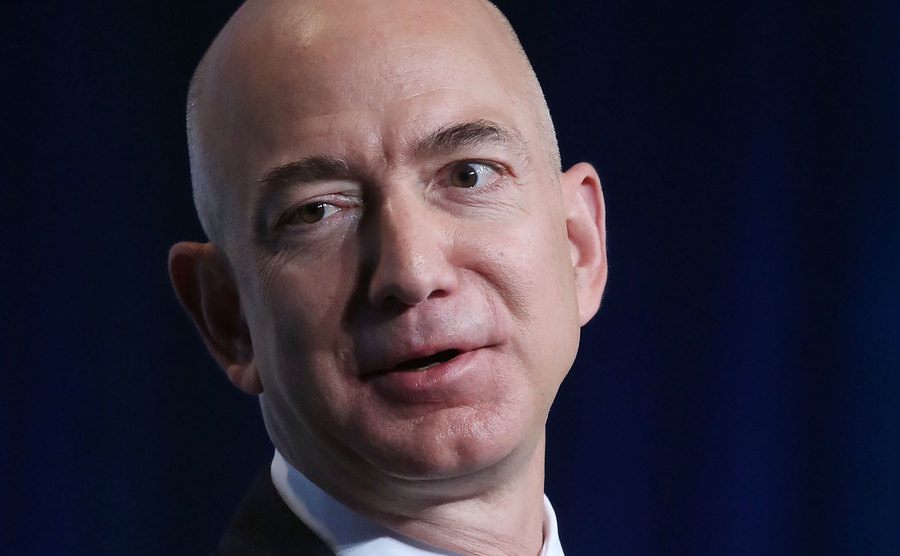 A picture of Bezos speaking during a convention.