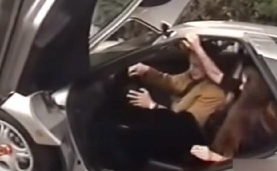 A dated photo of Musk in his McLaren.