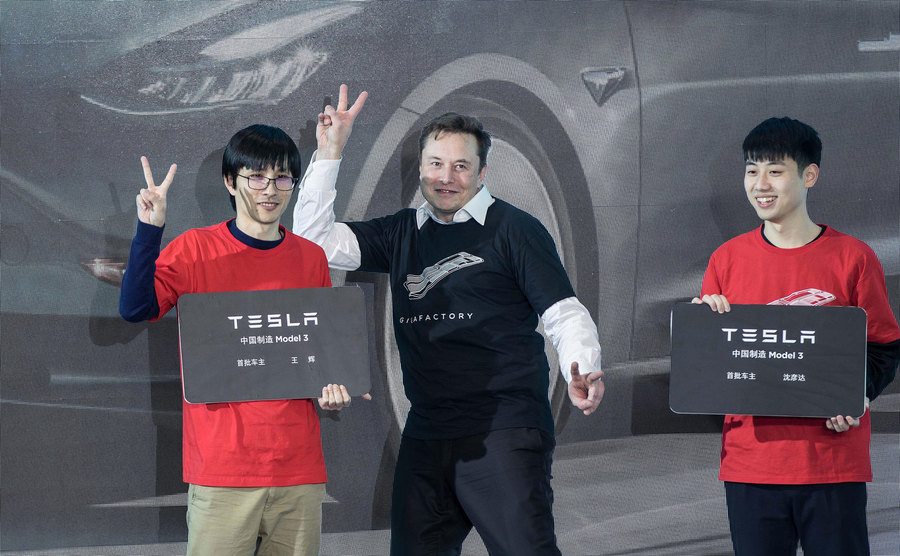 Musk poses for the press in China.
