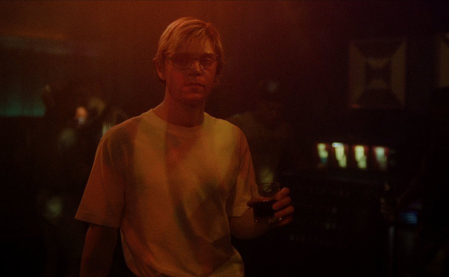 Peters, as Dahmer, is dancing in a club.